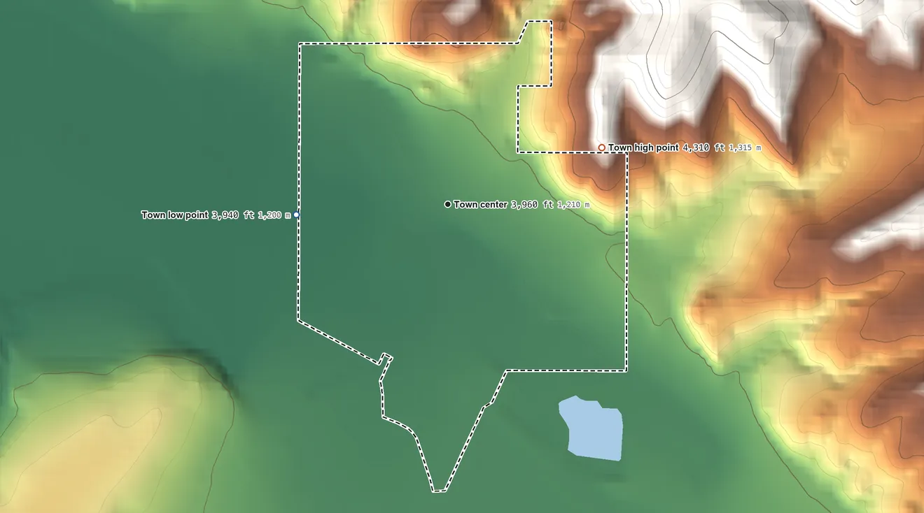 Topographic elevation map of Drummond, Montana, shaded from 3,940 ft on the west side to 4,310 ft at the foot of the Garnet Range