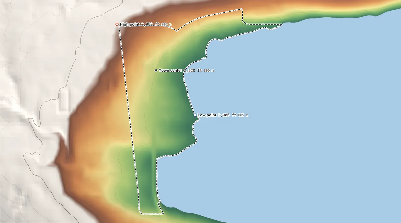 Topographic elevation map of Elmo, Montana, shaded from 2,900 ft on the southeast side to 2,980 ft on the northwest edge, below higher ground just outside