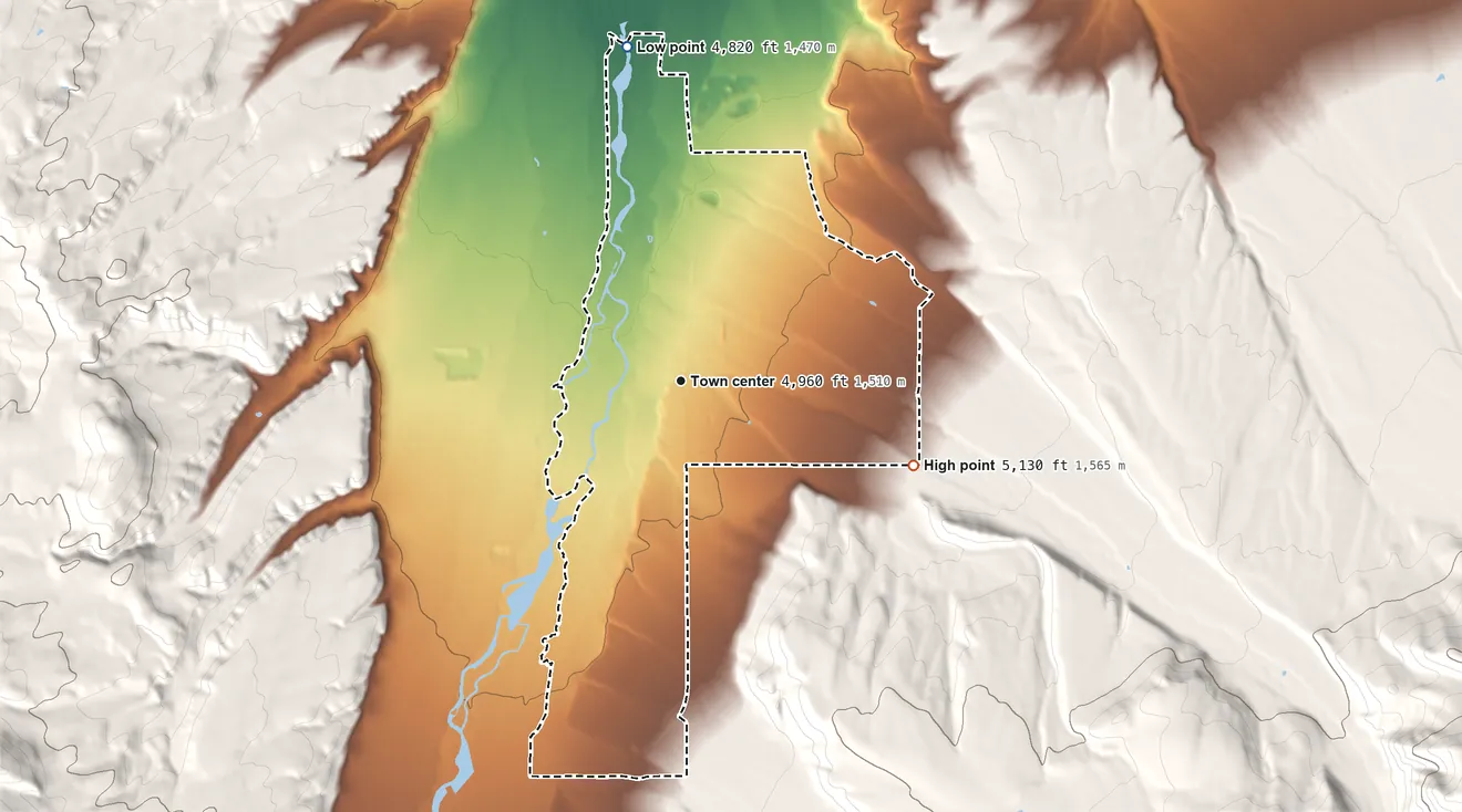 Topographic elevation map of Gallatin Gateway, Montana, shaded from 4,820 ft on the north side to 5,130 ft on the east edge, below higher ground just outside