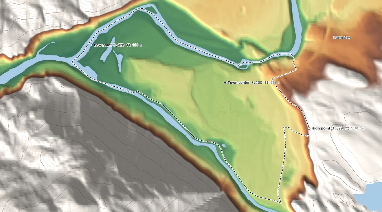 Topographic elevation map of Hungry Horse, Montana, shaded from 3,020 ft on the west side to 3,320 ft at the foot of the Smoky Range