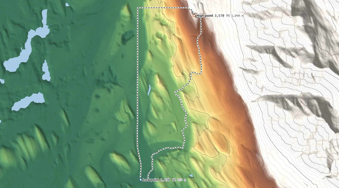 Topographic elevation map of Indian Springs, Montana, shaded from 2,670 ft on the south side to 3,570 ft at the foot of the Galton Range