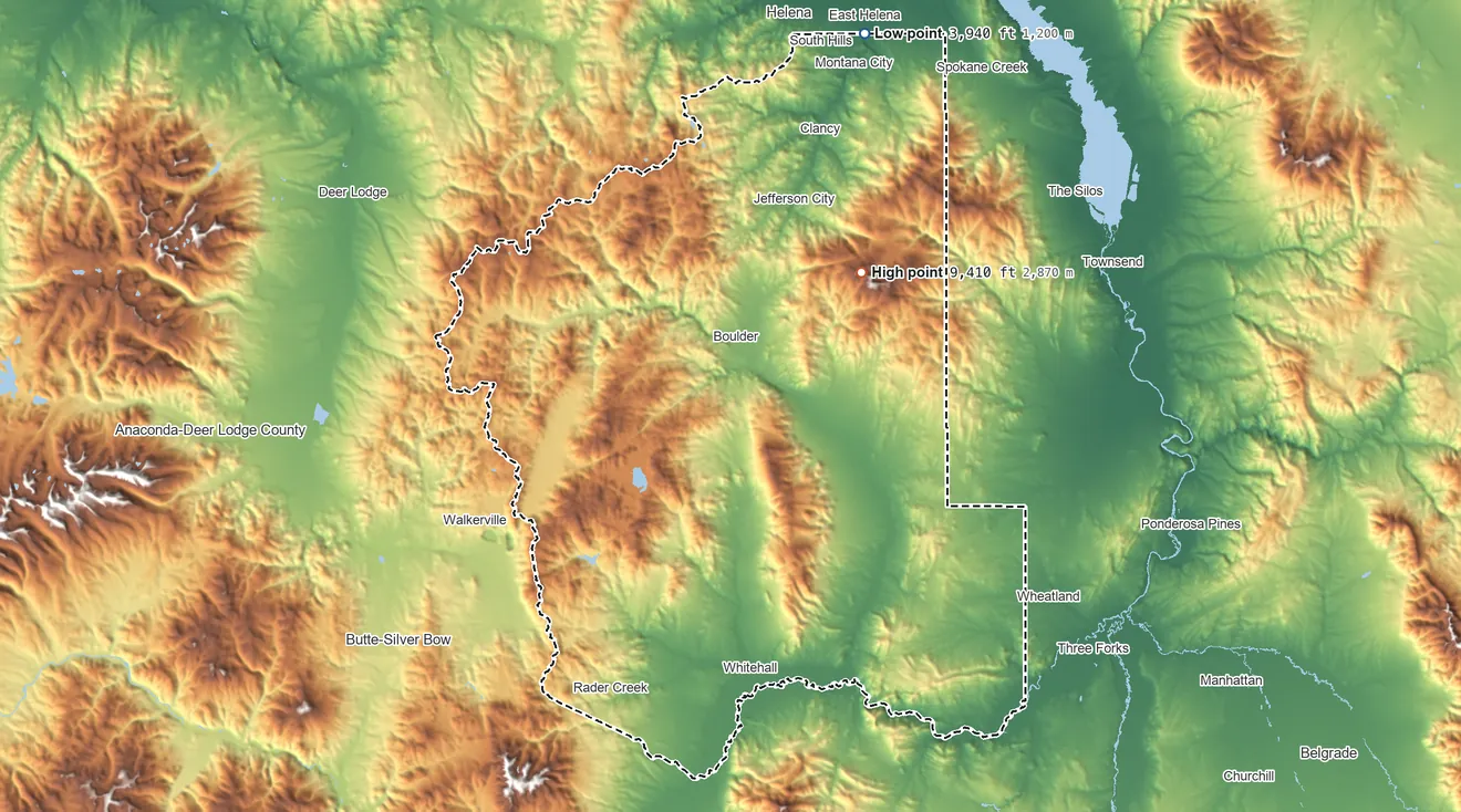 Topographic elevation map of Jefferson County, Montana, shaded from 3,940 ft on the north side to 9,410 ft on Elkhorn Peak