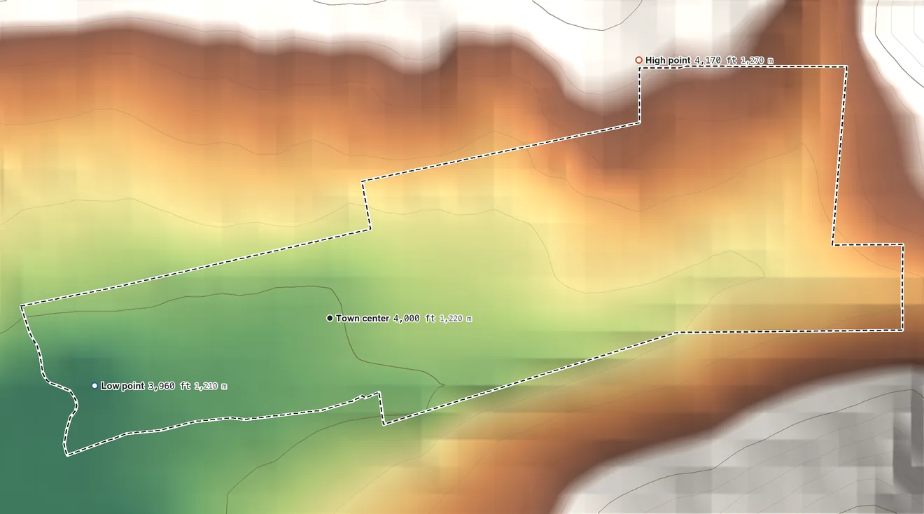 Topographic elevation map of Landusky, Montana, shaded from 3,960 ft on the west side to 4,170 ft at the foot of the Little Rocky Mountains