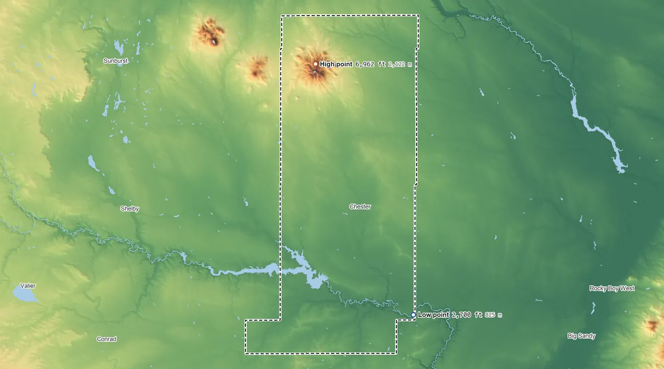 Topographic elevation map of Liberty County, Montana, shaded from 2,700 ft on the southeast side to 6,962 ft on Mount Brown