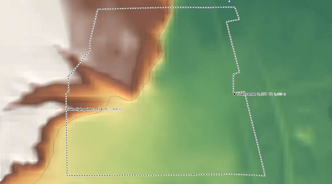 Topographic elevation map of Lodge Grass, Montana, shaded from 3,360 ft on the north side to 3,450 ft on the west side