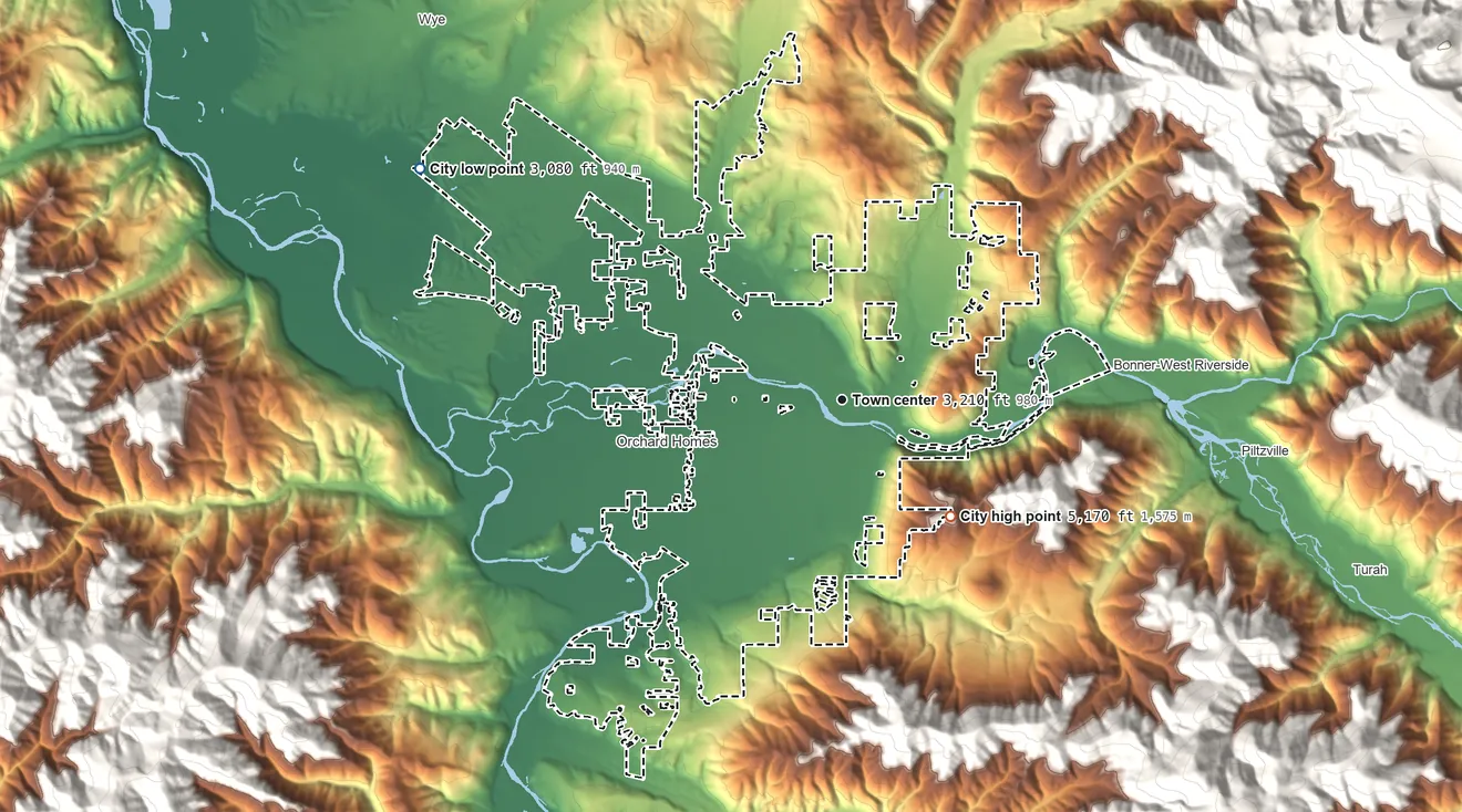 Topographic elevation map of Missoula, Montana, shaded from 3,080 ft on the northwest side to 5,170 ft at the foot of the South Hills