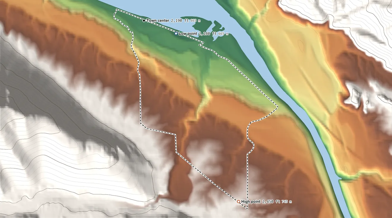 Topographic elevation map of Noxon, Montana, shaded from 2,180 ft on the east side to 2,450 ft on the southeast edge, below higher ground just outside