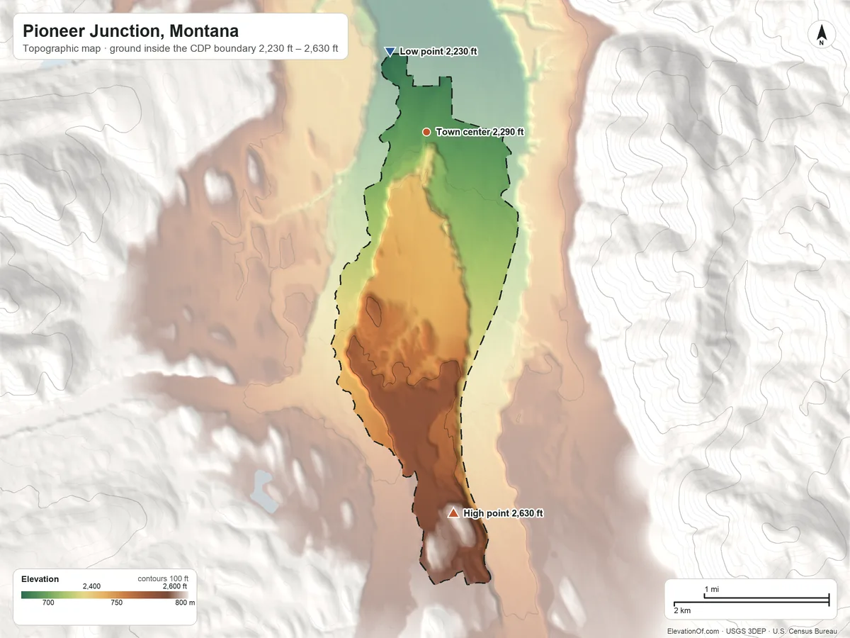 Topographic elevation map of Pioneer Junction, Montana, shaded from 2,230 ft on the northwest side to 2,630 ft at the foot of the Cabinet Mountains