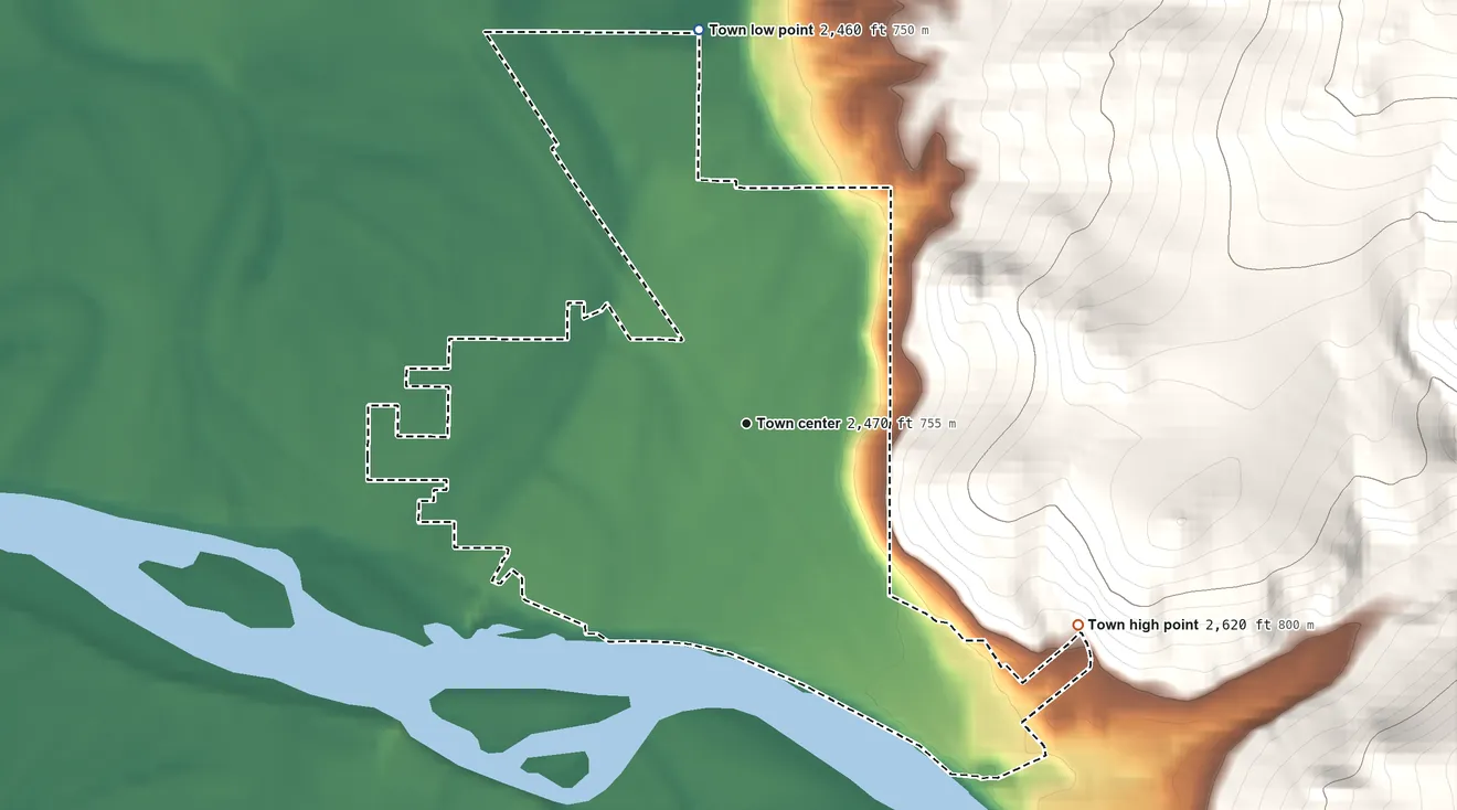 Topographic elevation map of Plains, Montana, shaded from 2,460 ft on the north side to 2,620 ft at the foot of the Coeur d'Alene Mountains