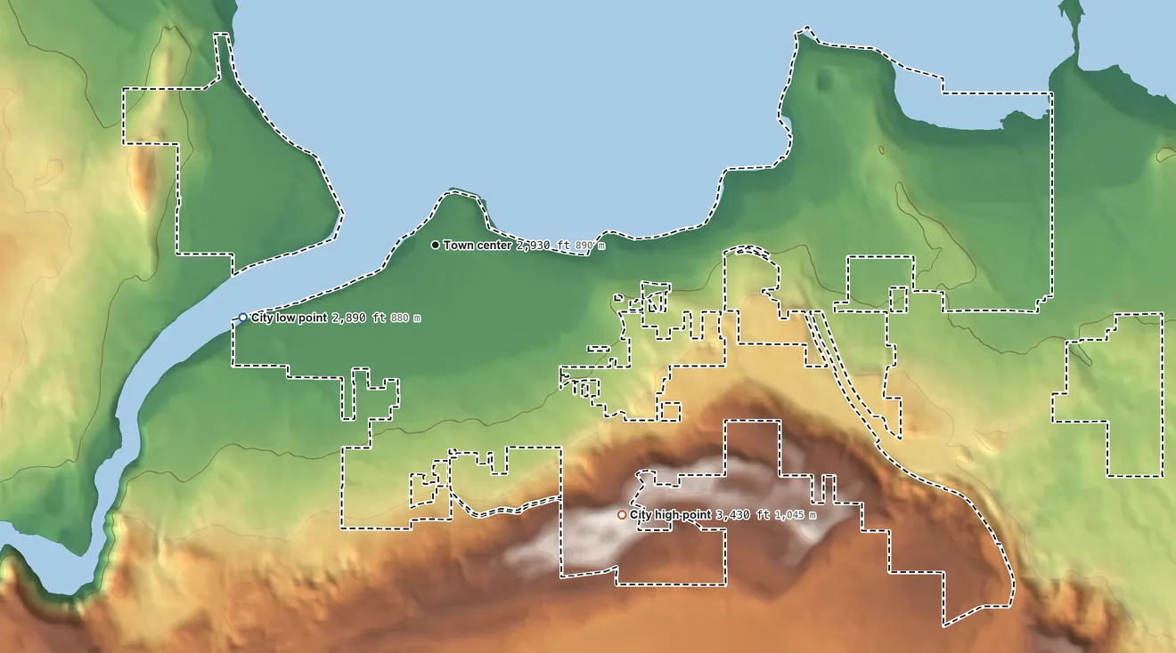 Topographic elevation map of Polson, Montana, shaded from 2,890 ft on the west side to 3,430 ft on the southeast side