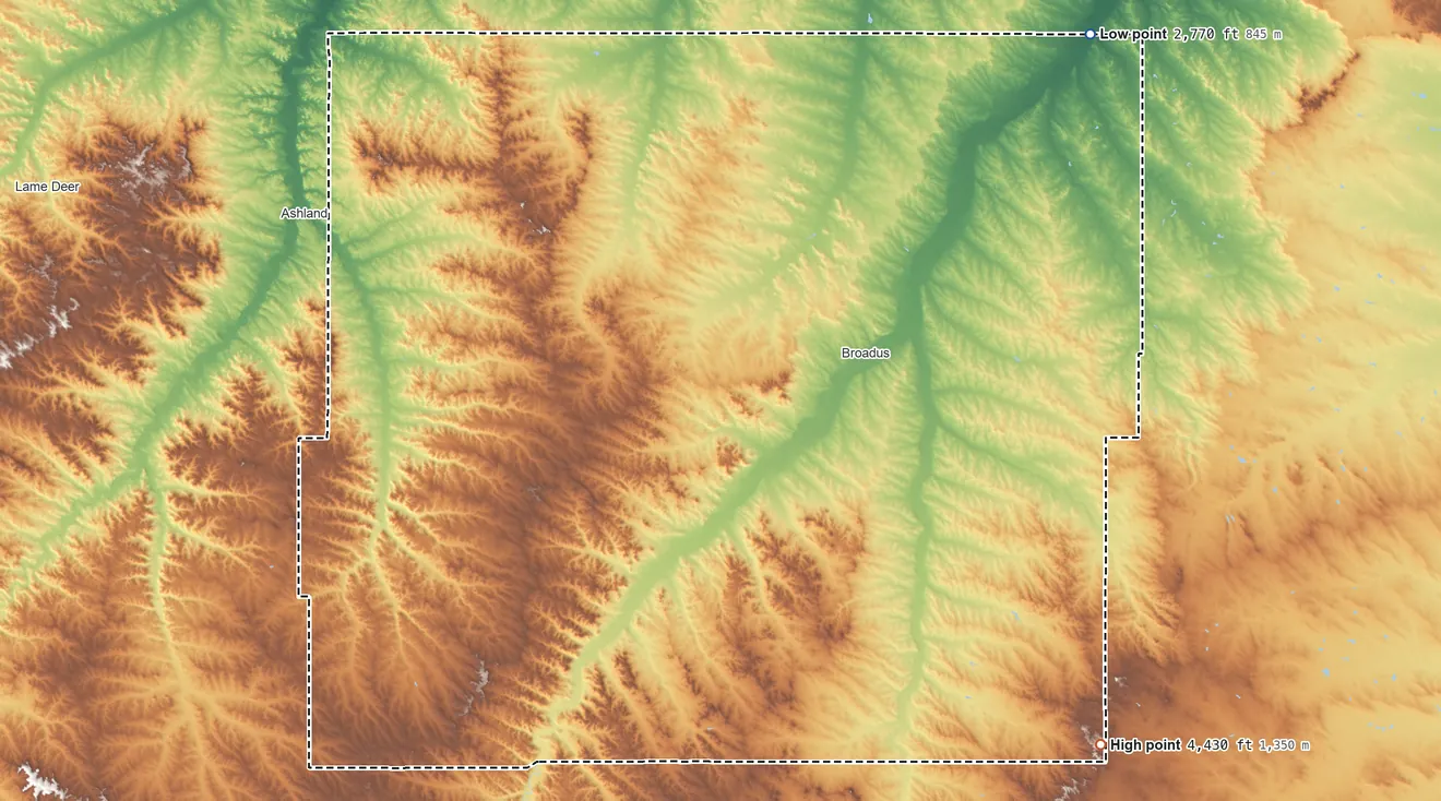 Topographic elevation map of Powder River County, Montana, shaded from 2,770 ft on the northeast side to 4,430 ft on the southeast side
