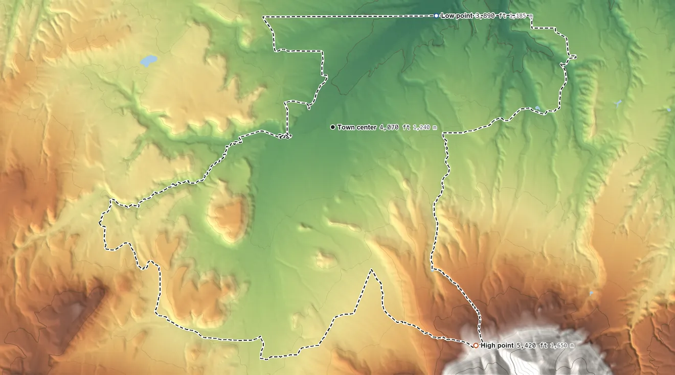 Topographic elevation map of Pryor, Montana, shaded from 3,890 ft on the northeast side to 5,420 ft at the foot of the Pryor Mountains