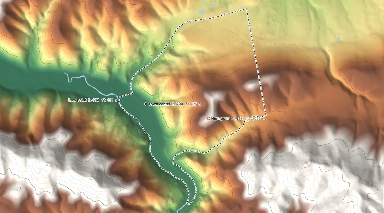 Topographic elevation map of Ravalli, Montana, shaded from 2,680 ft on the west side to 3,950 ft on the east edge, below higher ground just outside