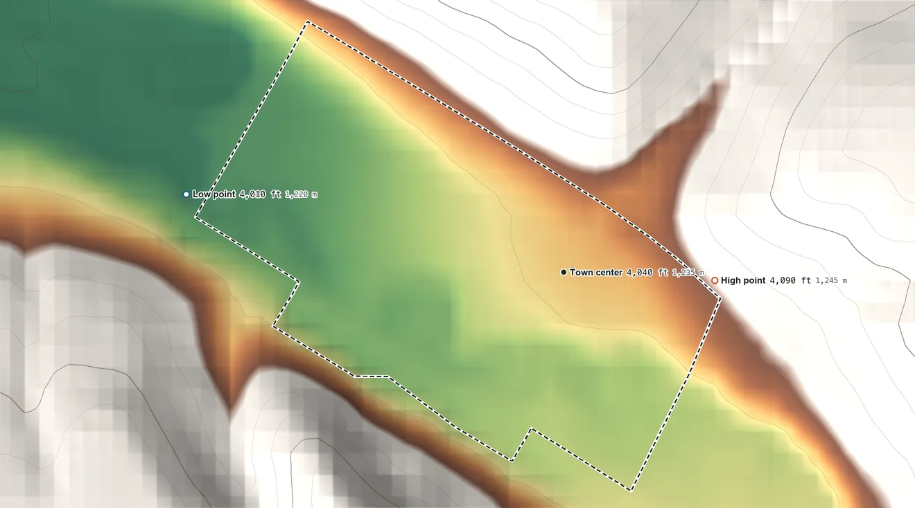 Topographic elevation map of Raynesford, Montana, shaded from 4,010 ft on the west side to 4,090 ft at the foot of the Highwood Mountains