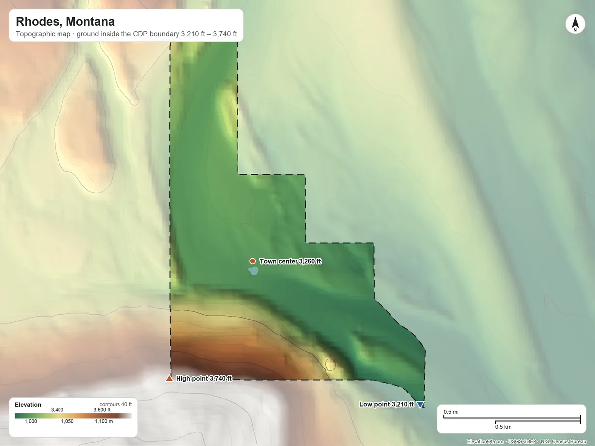Topographic elevation map of Rhodes, Montana, shaded from 3,210 ft on the southeast side to 3,740 ft at the foot of the Salish Mountains
