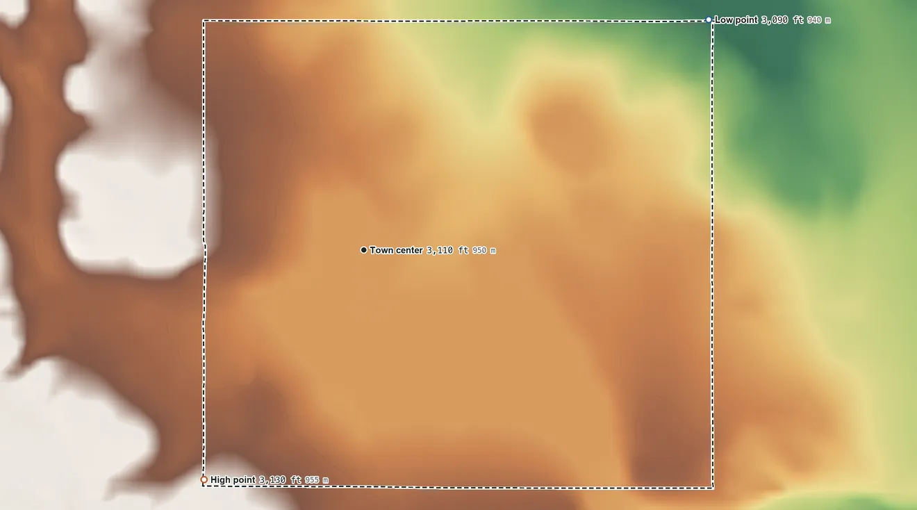 Topographic elevation map of Rudyard, Montana, shaded from 3,090 ft on the northeast side to 3,130 ft on the southwest side