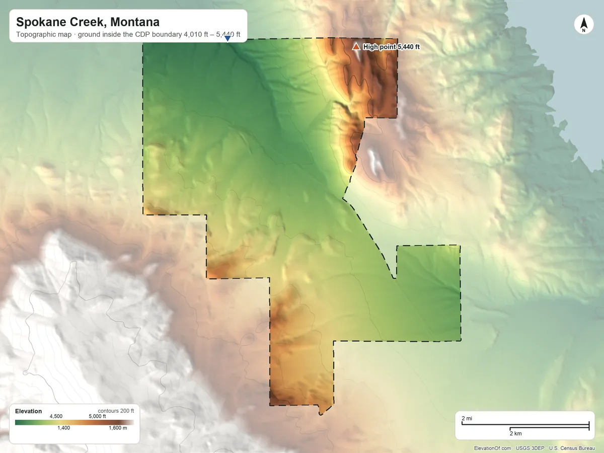 Topographic elevation map of Spokane Creek, Montana, shaded from 4,010 ft on the northwest side to 5,440 ft on the north side