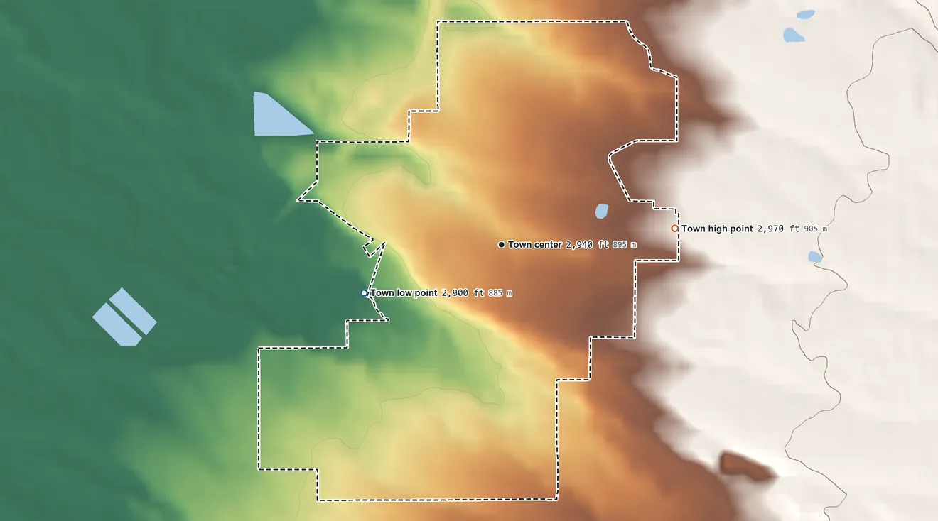 Topographic elevation map of St. Ignatius, Montana, shaded from 2,900 ft on the west side to 2,970 ft on the east edge, below higher ground just outside