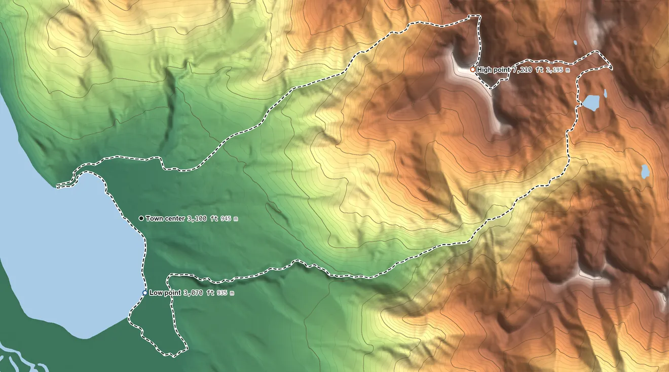 Topographic elevation map of Swan Lake, Montana, shaded from 3,070 ft on the south side to 7,210 ft on Con Kelley Mountain