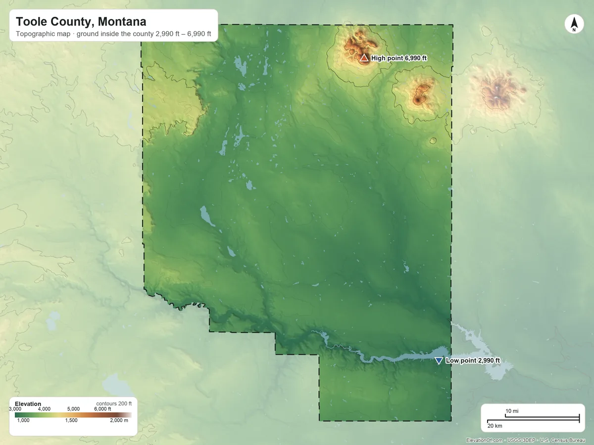 Topographic elevation map of Toole County, Montana, shaded from 2,990 ft on the southeast side to 6,990 ft on West Butte