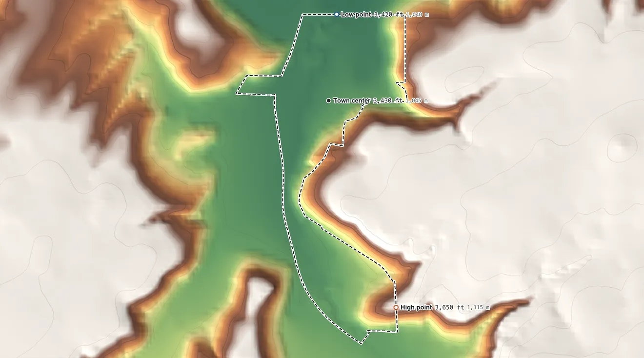 Topographic elevation map of Tracy, Montana, shaded from 3,420 ft on the north side to 3,650 ft on the south side