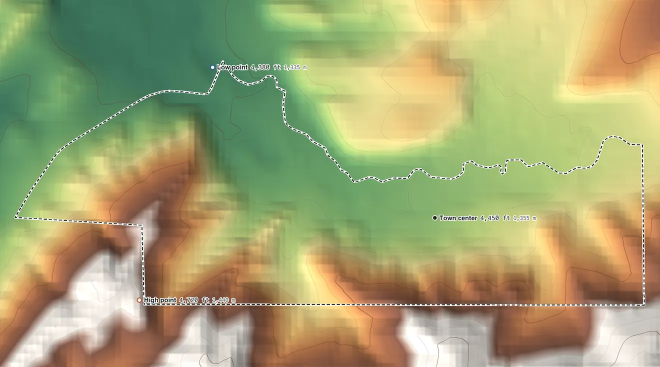 Topographic elevation map of Warm Spring Creek, Montana, shaded from 4,380 ft on the northwest side to 4,720 ft at the foot of the Judith Mountains