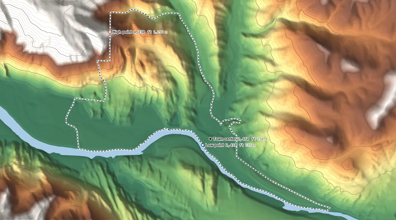 Topographic elevation map of Weeksville, Montana, shaded from 2,410 ft near the middle to 4,230 ft at the foot of the Coeur d'Alene Mountains