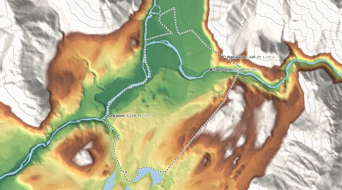 Topographic elevation map of West Glacier, Montana, shaded from 3,120 ft on the southwest side to 3,690 ft at the foot of the Smoky Range
