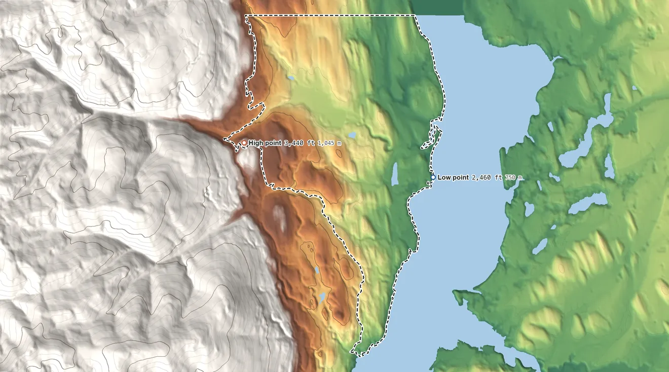 Topographic elevation map of West Kootenai, Montana, shaded from 2,460 ft on the southeast side to 3,440 ft at the foot of the Galton Range