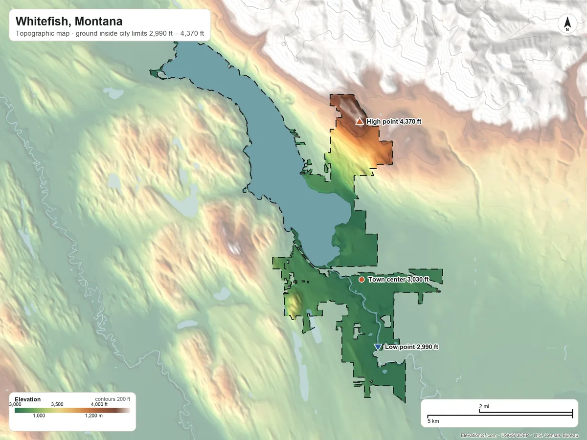 Topographic elevation map of Whitefish, Montana, shaded from 2,990 ft on the south side to 4,370 ft at the foot of the Smoky Range