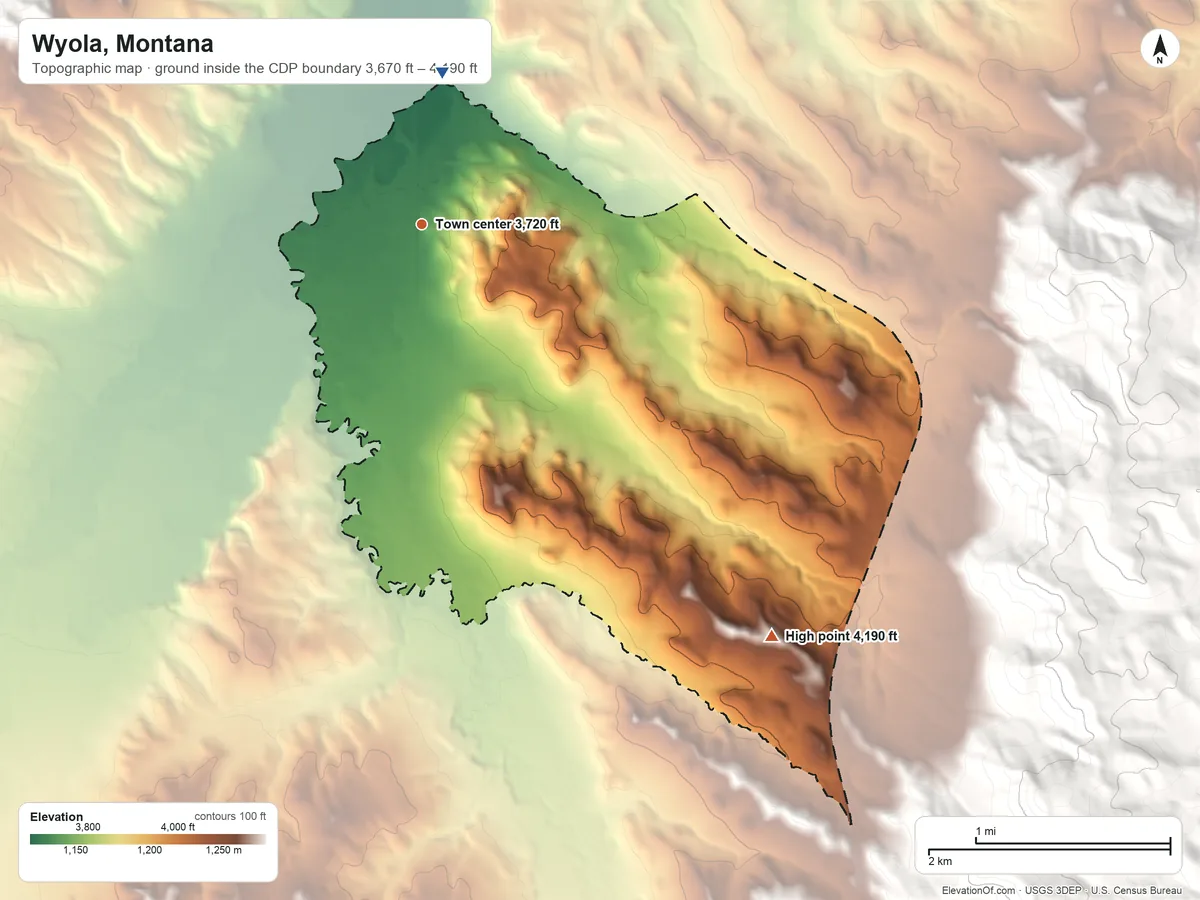 Topographic elevation map of Wyola, Montana, shaded from 3,670 ft on the north side to 4,190 ft at the foot of the Wolf Mountains