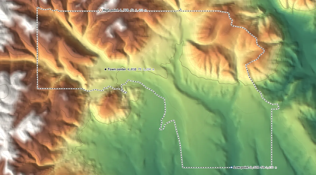 Topographic elevation map of Zortman, Montana, shaded from 3,710 ft on the southeast side to 4,770 ft at the foot of the Little Rocky Mountains