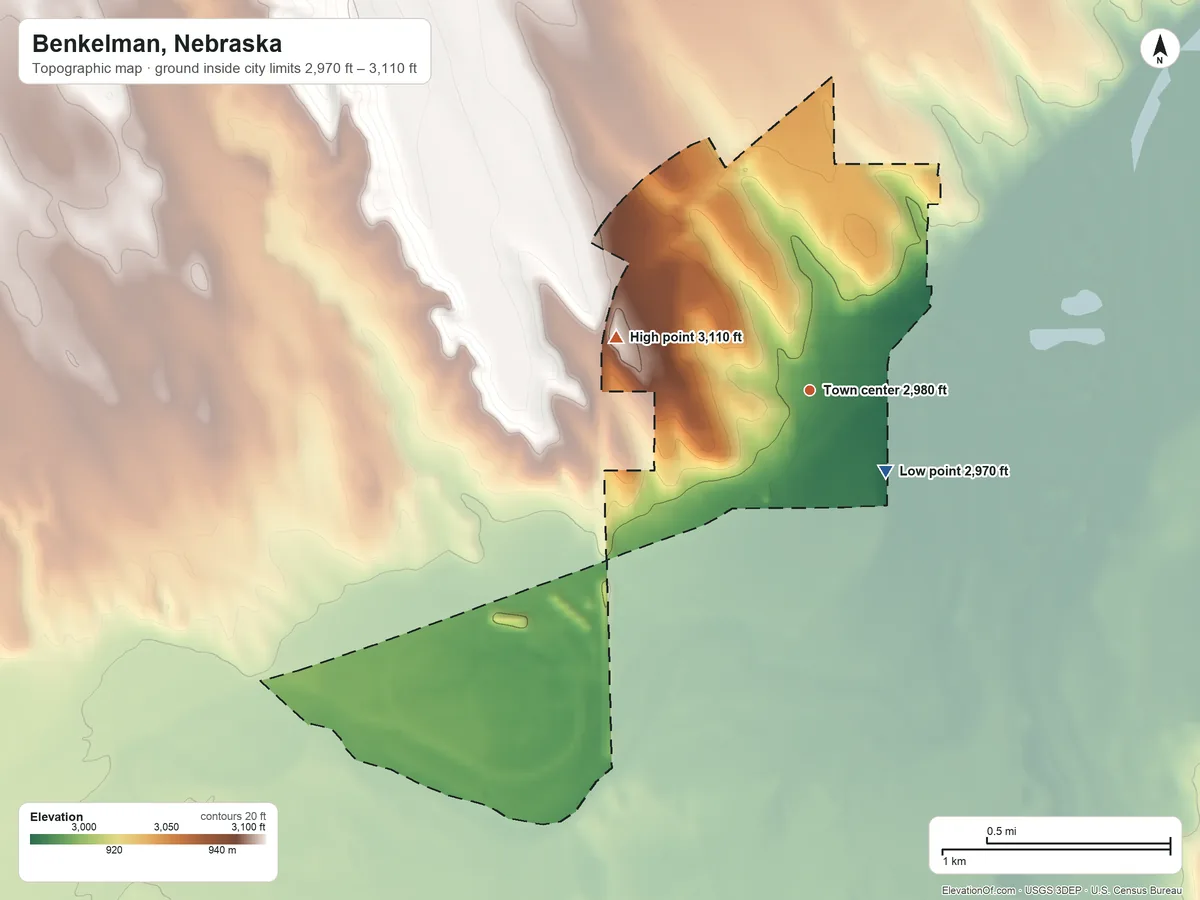 Topographic elevation map of Benkelman, Nebraska, shaded from 2,970 ft on the southeast side to 3,110 ft on the west side