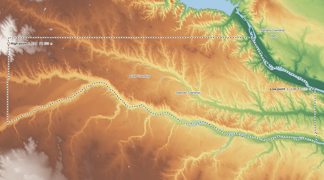 Topographic elevation map of Boyd County, Nebraska, shaded from 1,220 ft on the east side to 2,210 ft on the west side