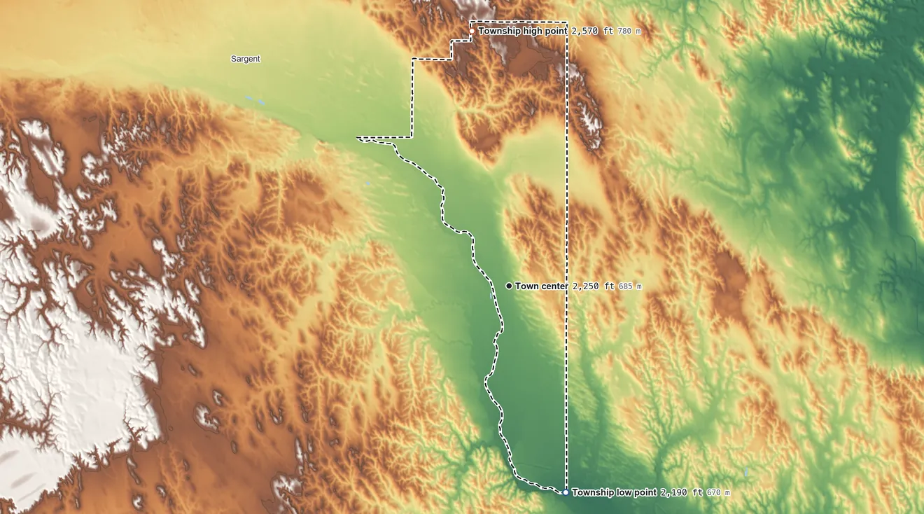 Topographic elevation map of Comstock Township, Nebraska, shaded from 2,190 ft on the south side to 2,570 ft on the north side