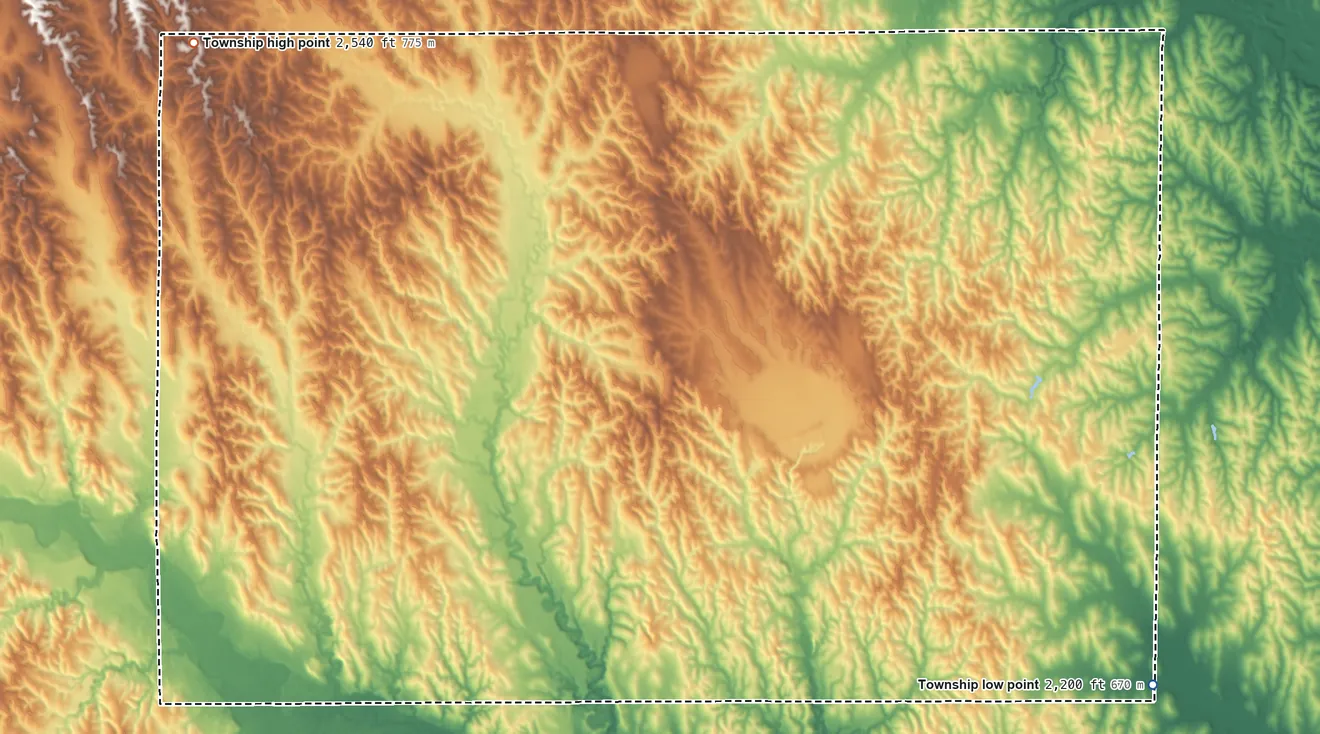 Topographic elevation map of Elk Creek Township, Nebraska, shaded from 2,200 ft on the east side to 2,540 ft on the northwest side