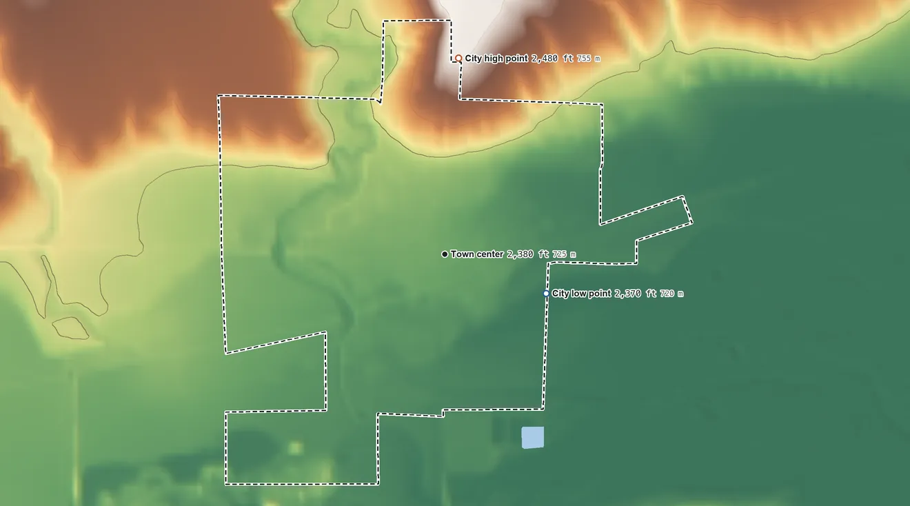 Topographic elevation map of Indianola, Nebraska, shaded from 2,370 ft on the east side to 2,480 ft on the north side