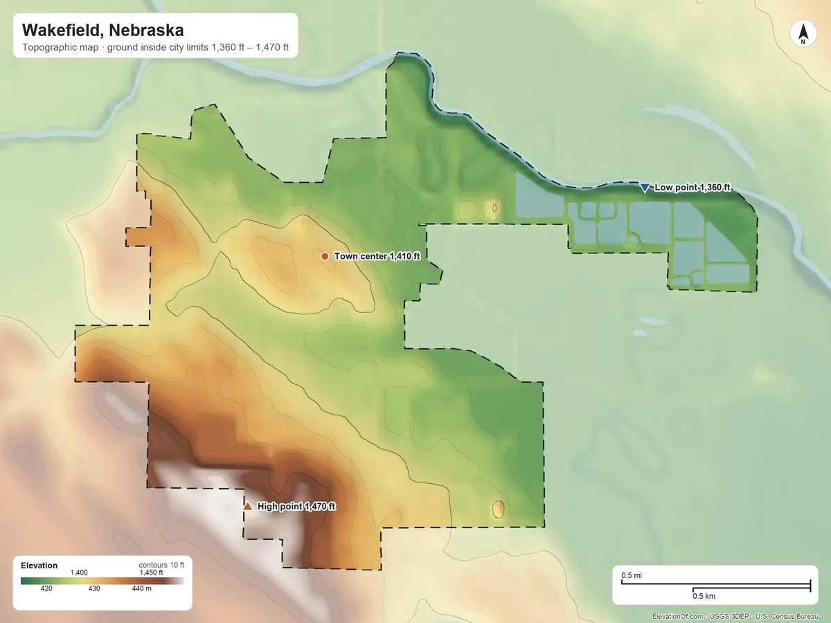Topographic elevation map of Wakefield, Nebraska, shaded from 1,360 ft on the east side to 1,470 ft on the south side