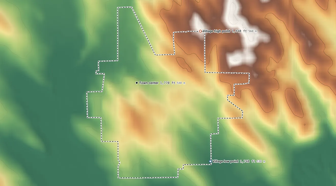 Topographic elevation map of Wausa, Nebraska, shaded from 1,740 ft on the southeast side to 1,840 ft on the northeast side