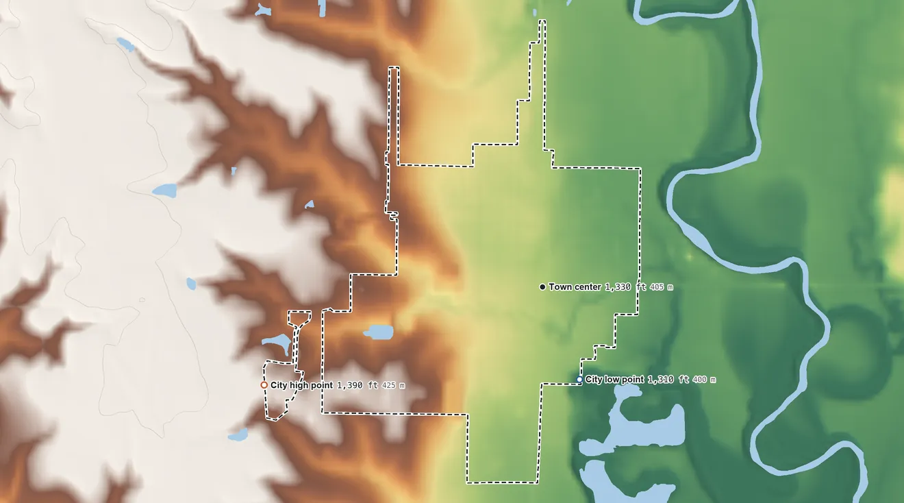 Topographic elevation map of Wilber, Nebraska, shaded from 1,310 ft on the south side to 1,390 ft on the west side