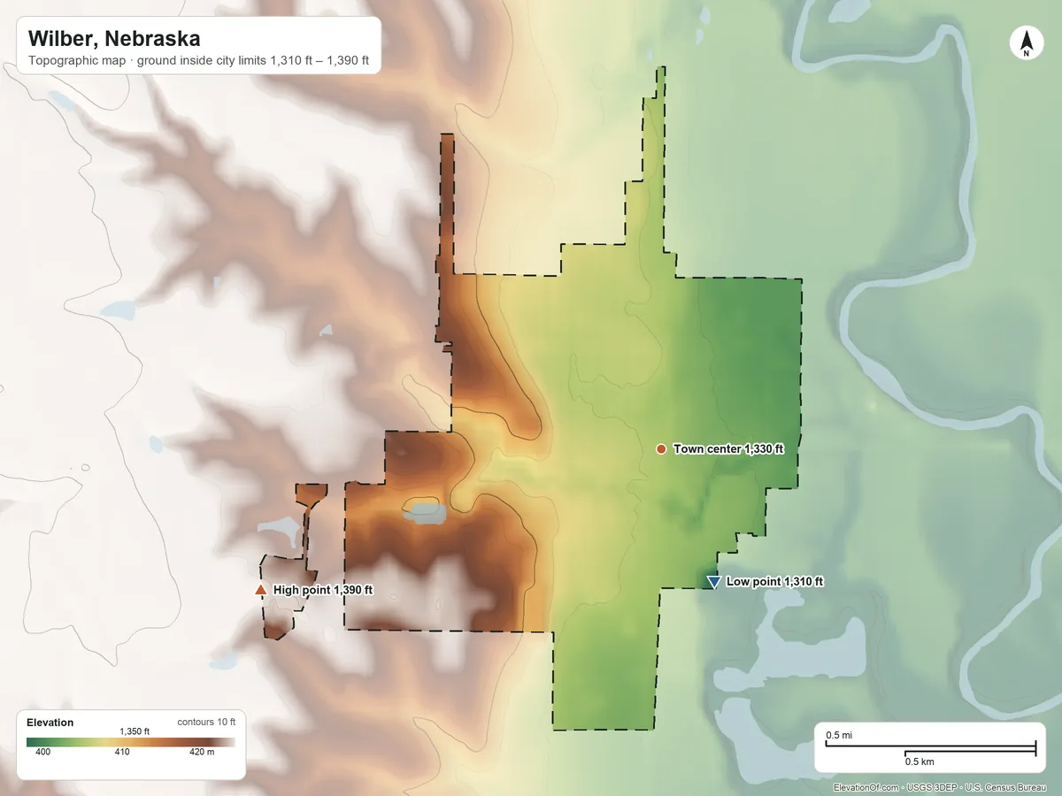 Topographic elevation map of Wilber, Nebraska, shaded from 1,310 ft on the south side to 1,390 ft on the west side