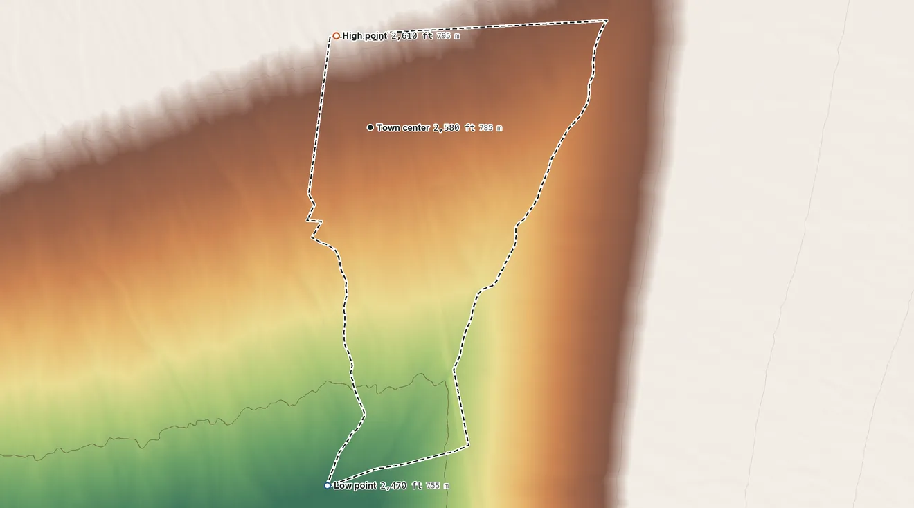 Topographic elevation map of Cal-Nev-Ari, Nevada, shaded from 2,470 ft on the south side to 2,610 ft on the north side