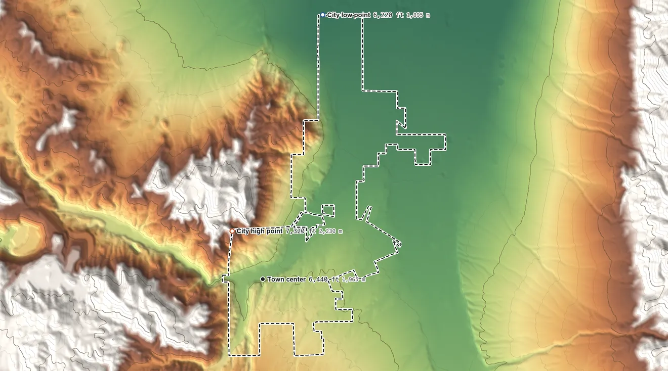 Topographic elevation map of Ely, Nevada, shaded from 6,220 ft on the north side to 7,320 ft at the foot of the Duck Creek Range