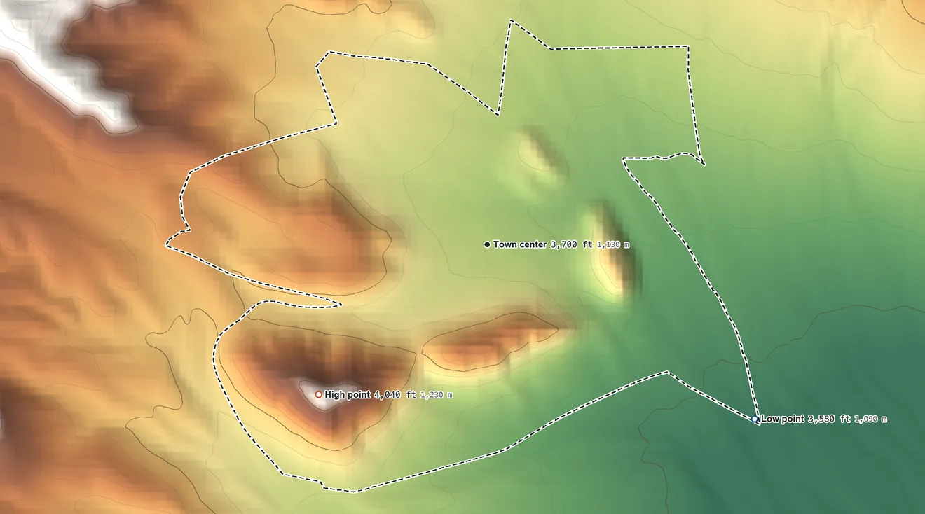 Topographic elevation map of Goodsprings, Nevada, shaded from 3,580 ft on the southeast side to 4,040 ft at the foot of the Bird Spring Range