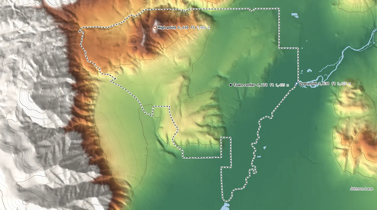 Topographic elevation map of Indian Hills, Nevada, shaded from 4,630 ft on the east side to 6,440 ft on the northwest side