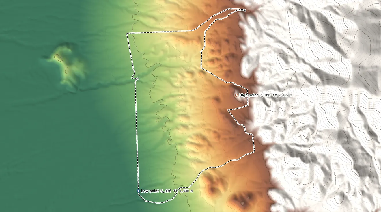 Topographic elevation map of Mount Wilson, Nevada, shaded from 6,330 ft on the south side to 7,100 ft at the foot of the Wilson Creek Range