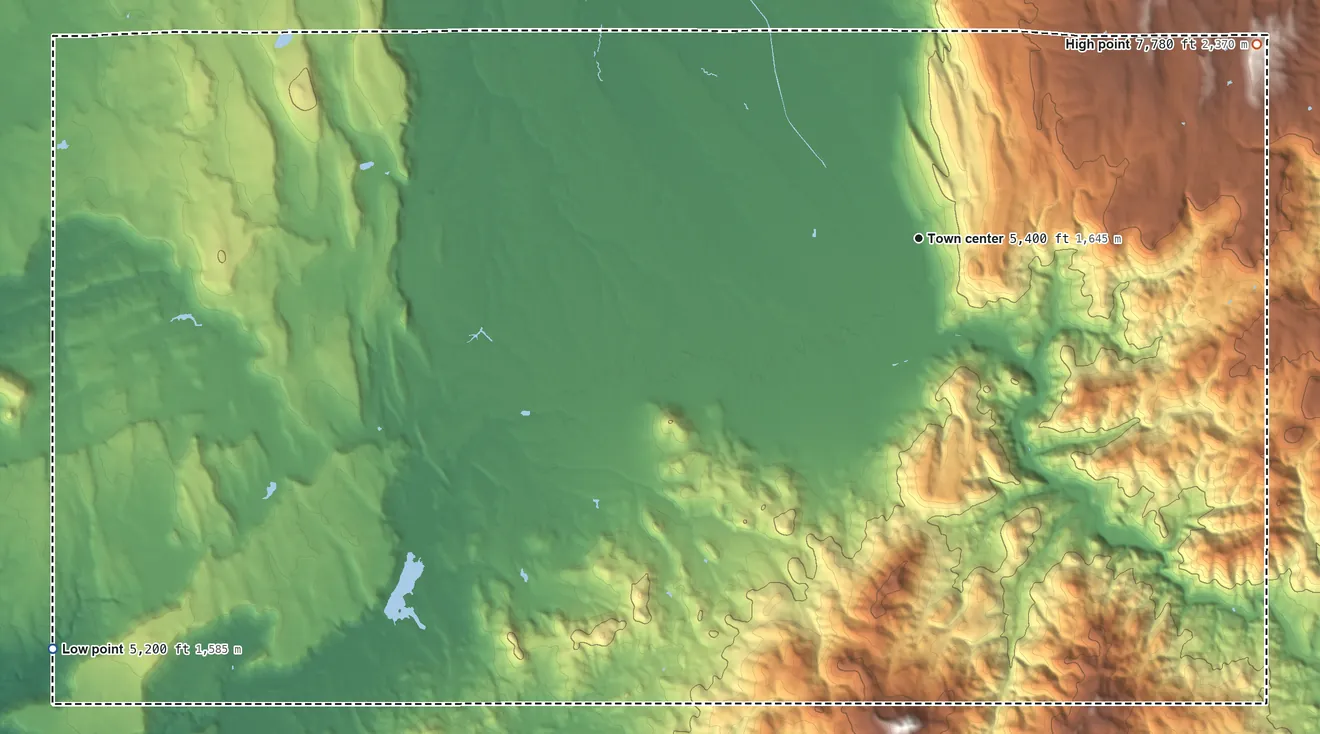 Topographic elevation map of Owyhee, Nevada, shaded from 5,200 ft on the southwest side to 7,780 ft on the northeast side