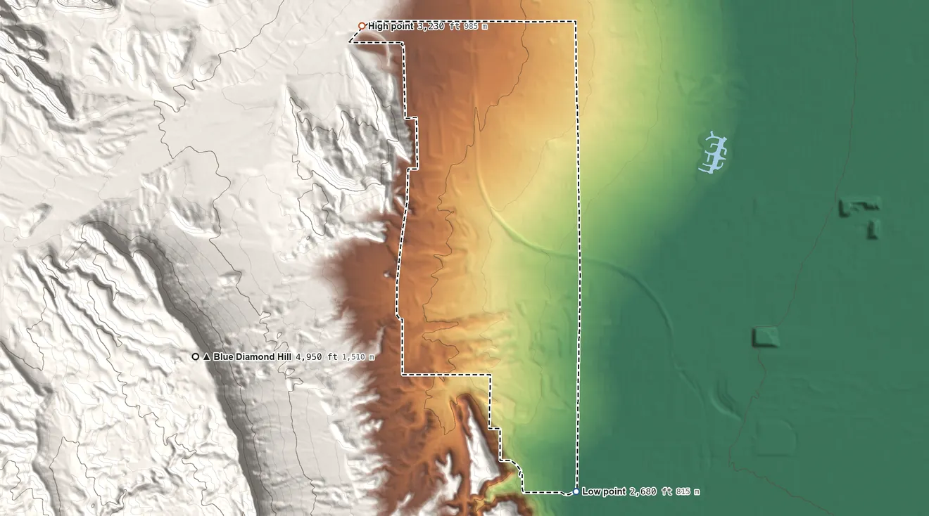 Topographic elevation map of Summerlin South, Nevada, shaded from 2,680 ft on the south side to 3,230 ft on the northwest edge, below higher ground just outside