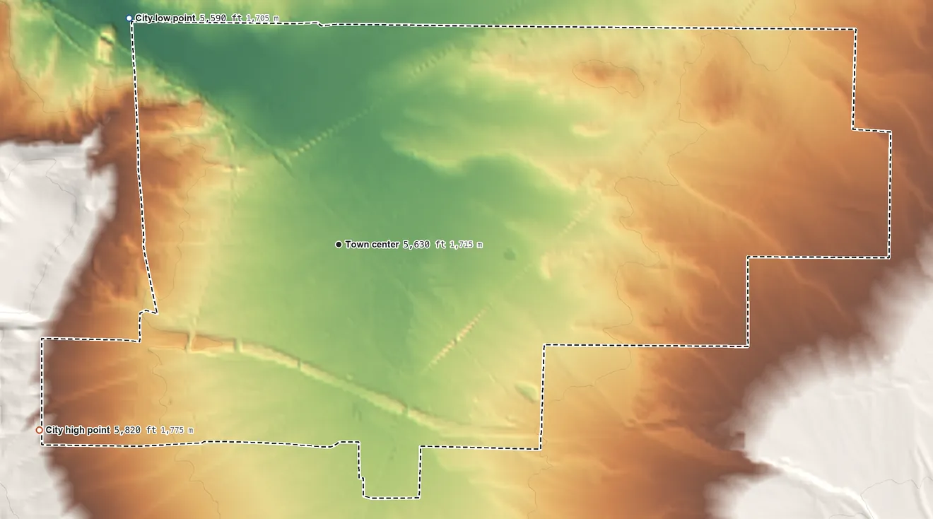 Topographic elevation map of Wells, Nevada, shaded from 5,590 ft on the northwest side to 5,820 ft at the foot of the Wood Hills