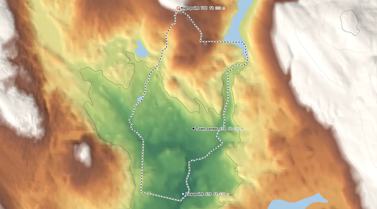 Topographic elevation map of Milton Mills, New Hampshire, shaded from 420 ft on the south side to 700 ft on the north edge, below higher ground just outside